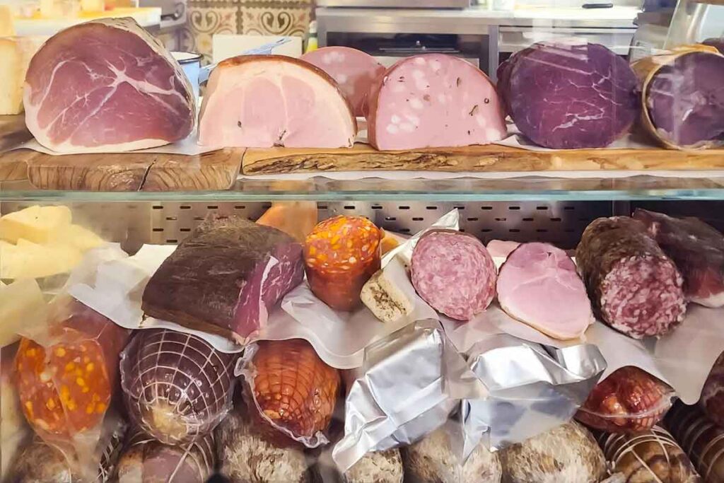 Deli freezer showcasing processed meats linked to increased diabetes and inflammation risk